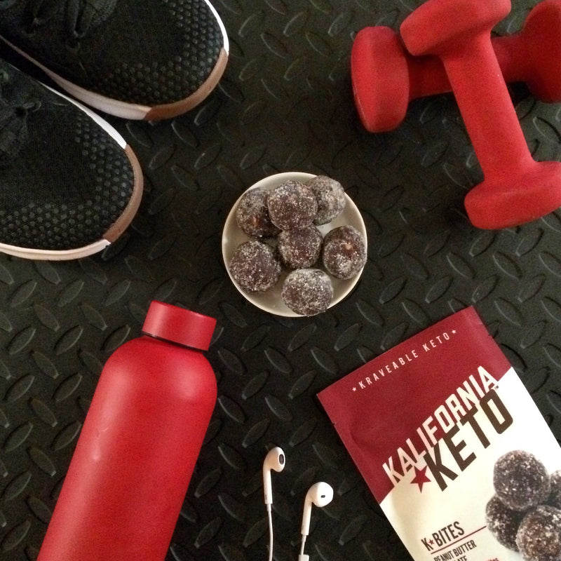Workout Setup with Peanut Butter Chocolate Keto No Bake Energy Fat Bombs, Dumbbells, Shoes, Headphones, and Water Bottle