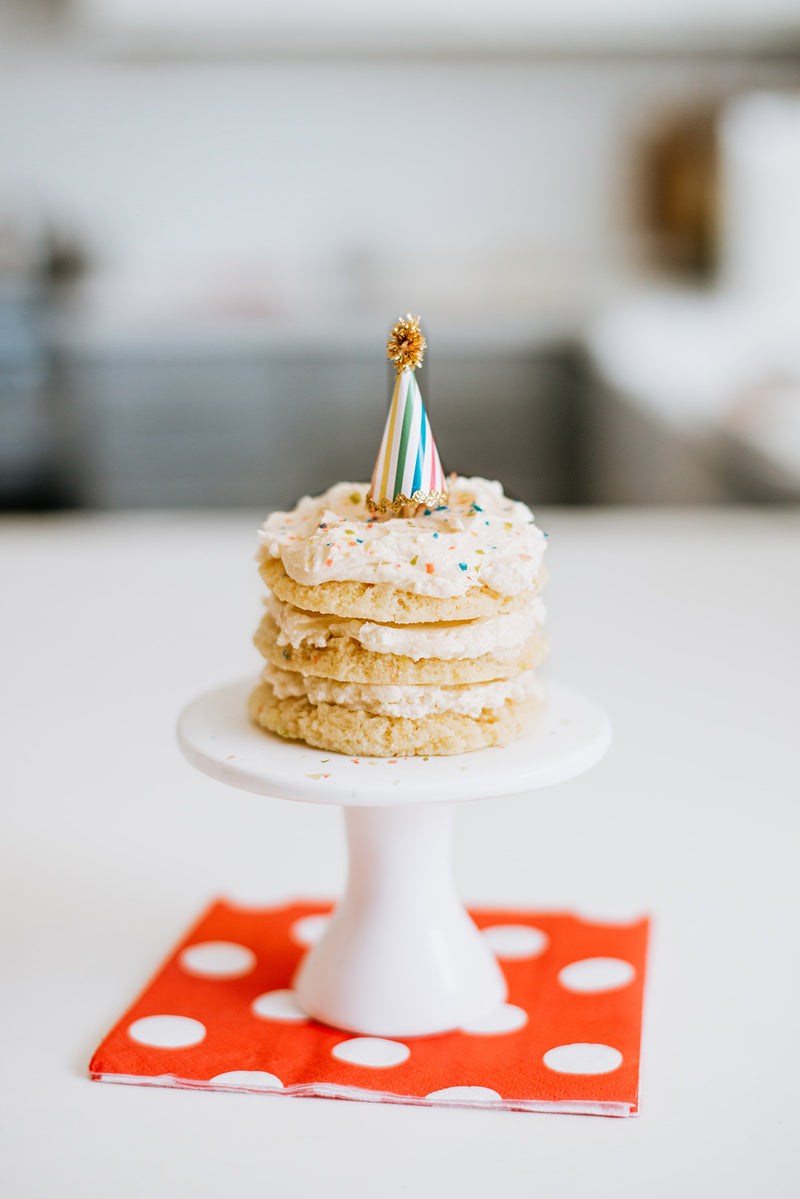 Keto Birthday Cake Cookie Sandwiches with Frosting and Sprinkles, Topped with Birthday Hats