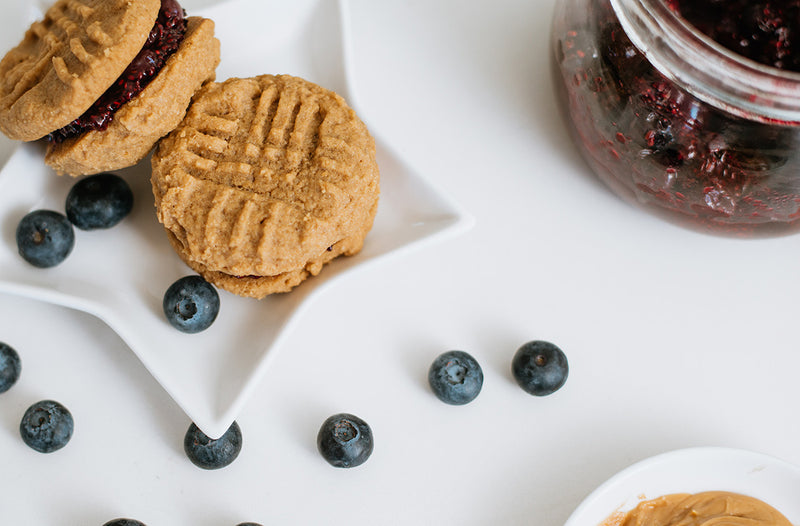 Keto Peanut Butter and Blueberry Jam Cookie Sandwiches on Star Plate